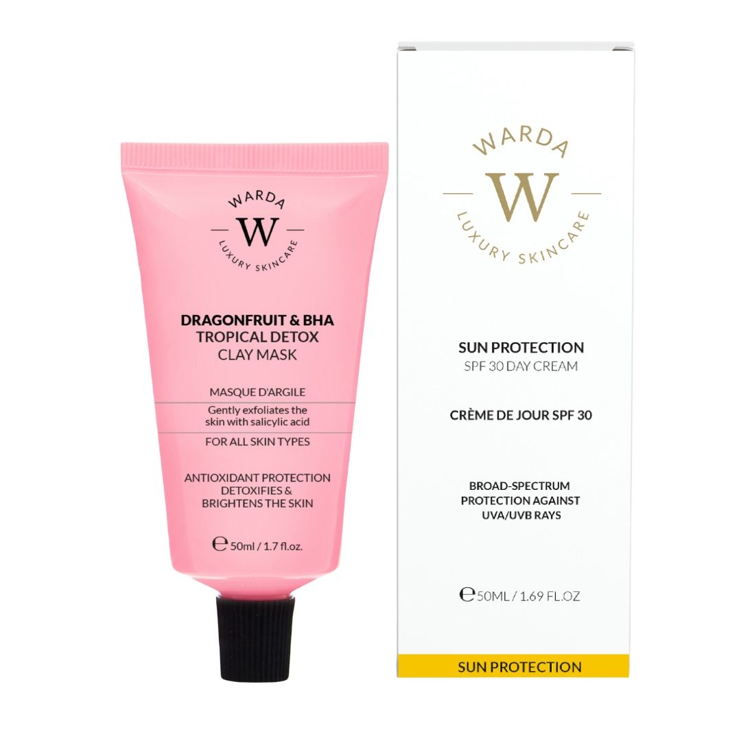 Tube rose et boîte blanche. Inscription: Warda Luxury Skincare, Dragonfruit & BHA Clay Mask, Crème de jour SPF 30.