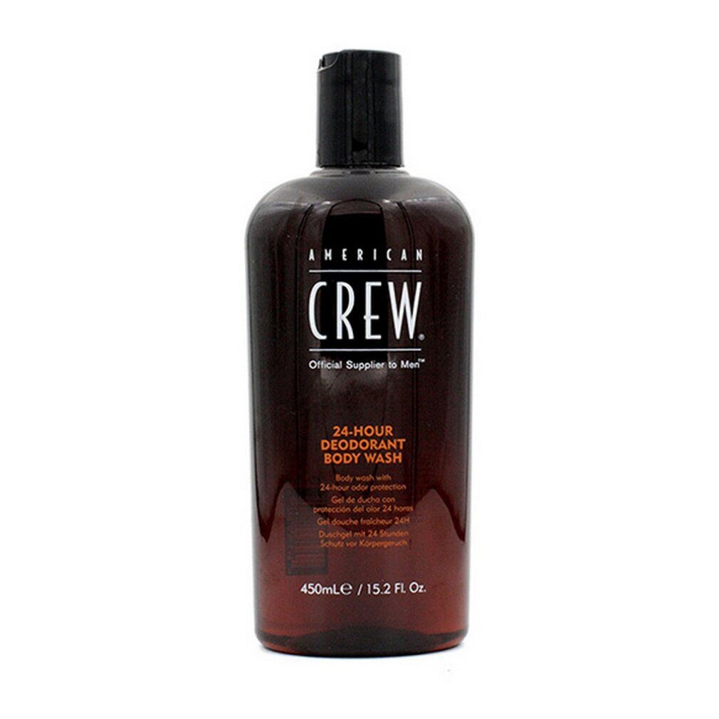 Bruine fles met zwarte dop. Opschrift: AMERICAN CREW, 24-HOUR DEODORANT BODY WASH. 450ml/15.2 Fl. Oz.