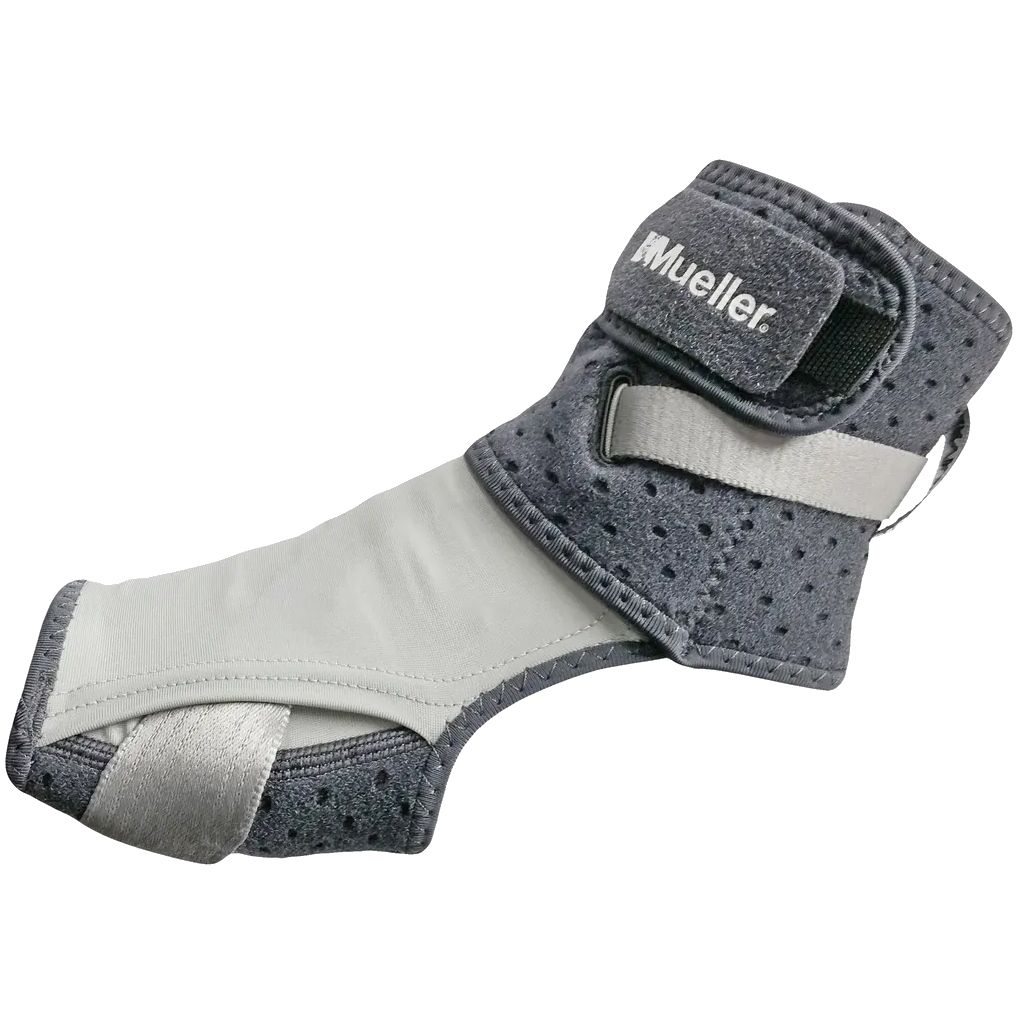 Support de pied avec velcro et logo. Matériaux gris et noirs. Vue de dessus.
