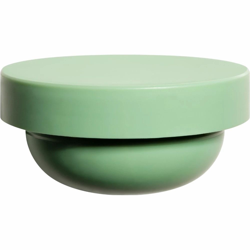 Pot de crème vert, rond, avec couvercle. Le couvercle est plat et rond, le pot a une forme arrondie.