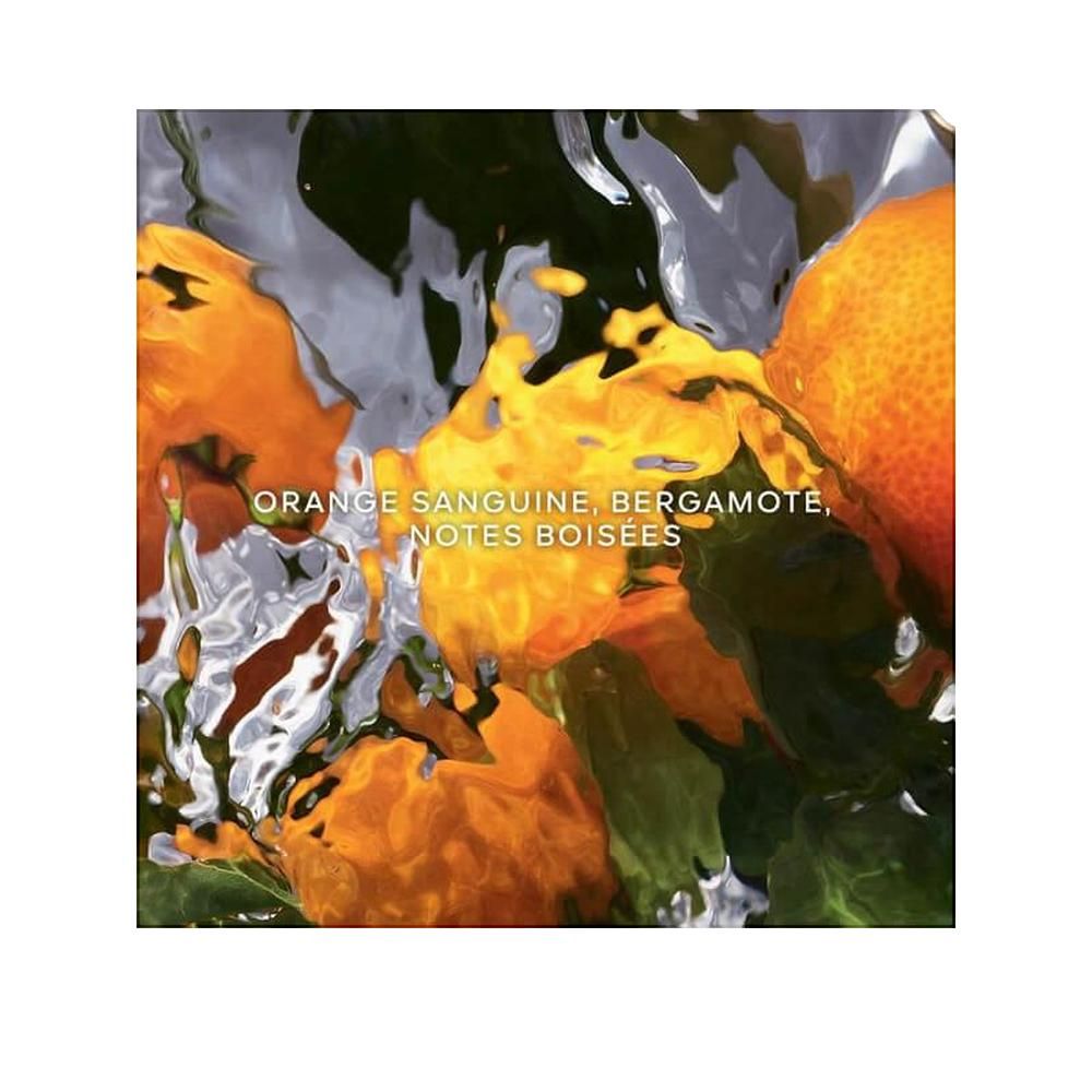 Sinaasappels en water. Tekst: Orange Sanguine, Bergamote, Notes Boisées.
