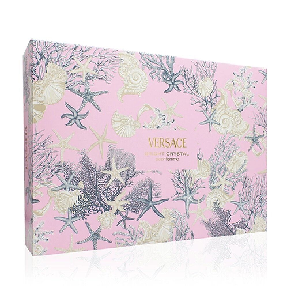 Rechthoekige geschenkverpakking met roze achtergrond en zeemotieven. Versace-logo en productnaam in goud op de voorkant.