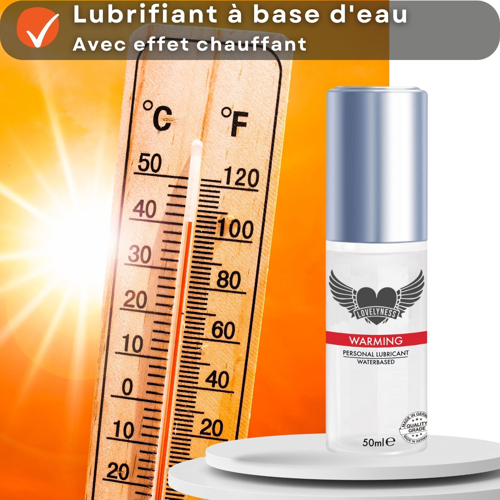 Flacon de gel lubrifiant à côté d'un thermomètre. Texte : "Lubrifiant à base d'eau", "Avec effet chauffant".