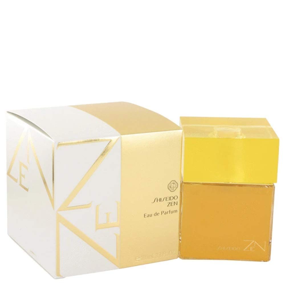 Flacon et emballage Shiseido Zen Eau de Parfum. Flacon carré avec bouchon jaune. Emballage blanc et doré.