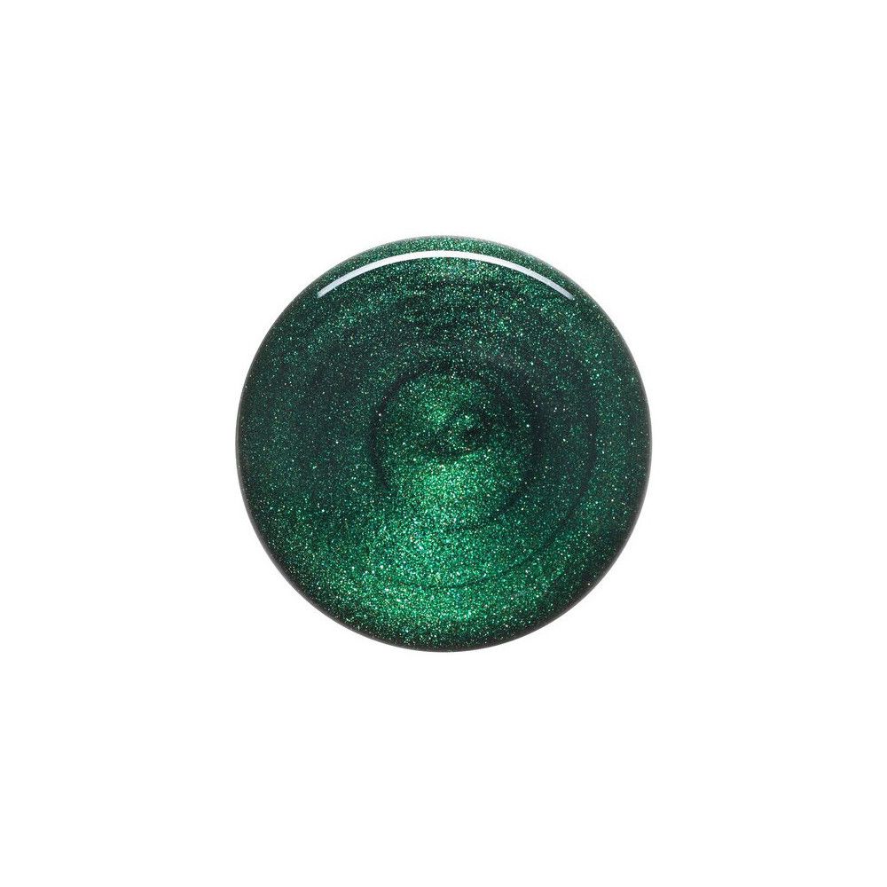 Tache circulaire de vernis à ongles vert. Surface brillante.