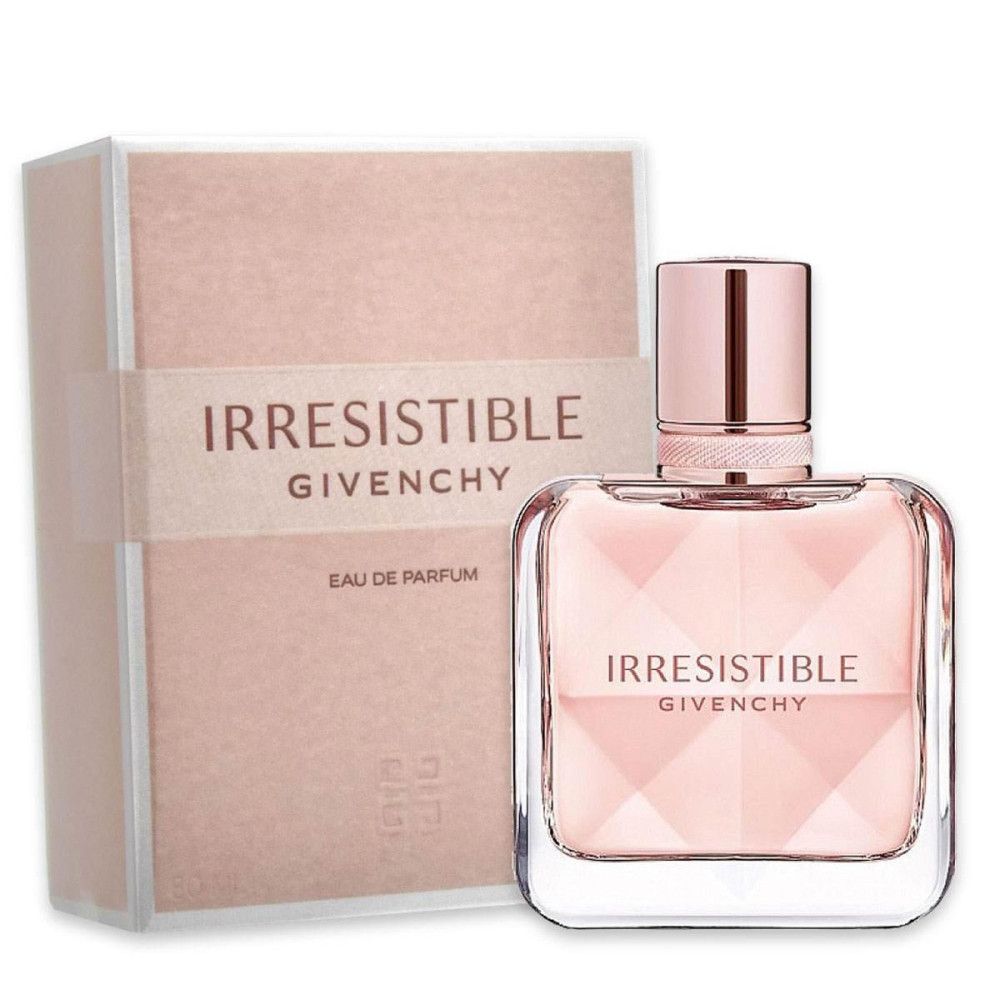 Parfumfles en verpakking. Vierkante fles, roze inhoud, roségouden dop. Roze verpakking met opschrift Irresistible Givenchy.