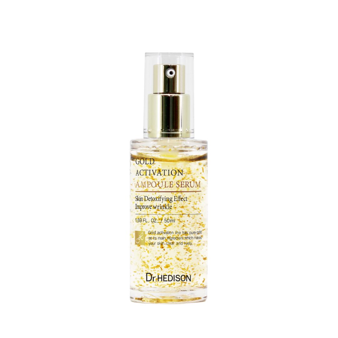 Serumfles met gouden deeltjes. Opschrift: Gold Activation Ampoule Serum, Dr. HEDISON.
